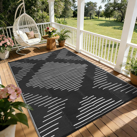 Garvee alfombra frontal mostrando diseño negro blanco y beneficio estético