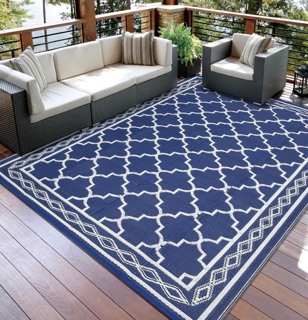Garvee vista frontal de la alfombra 8x10 mostrando diseño azul blanco y protección