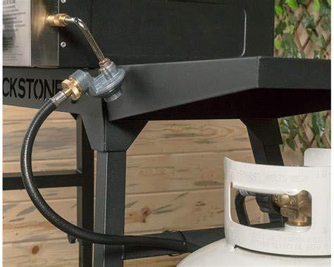GasSaf manguera conectada a parrilla portátil ampliando autonomía