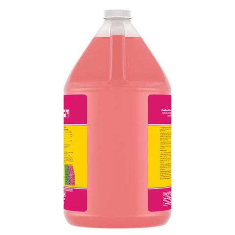 General Hydroponics botella junto a una regla para comparar tamaño y capacidad