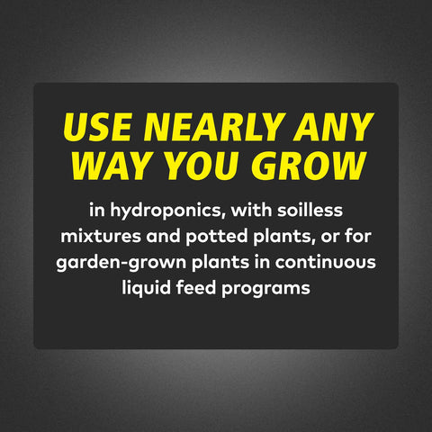 General Hydroponics botella junto a maceta para apreciar escala y uso doméstico