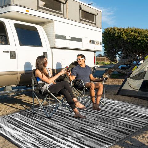 GENIMO alfombra colocada frente a RV para comodidad exterior