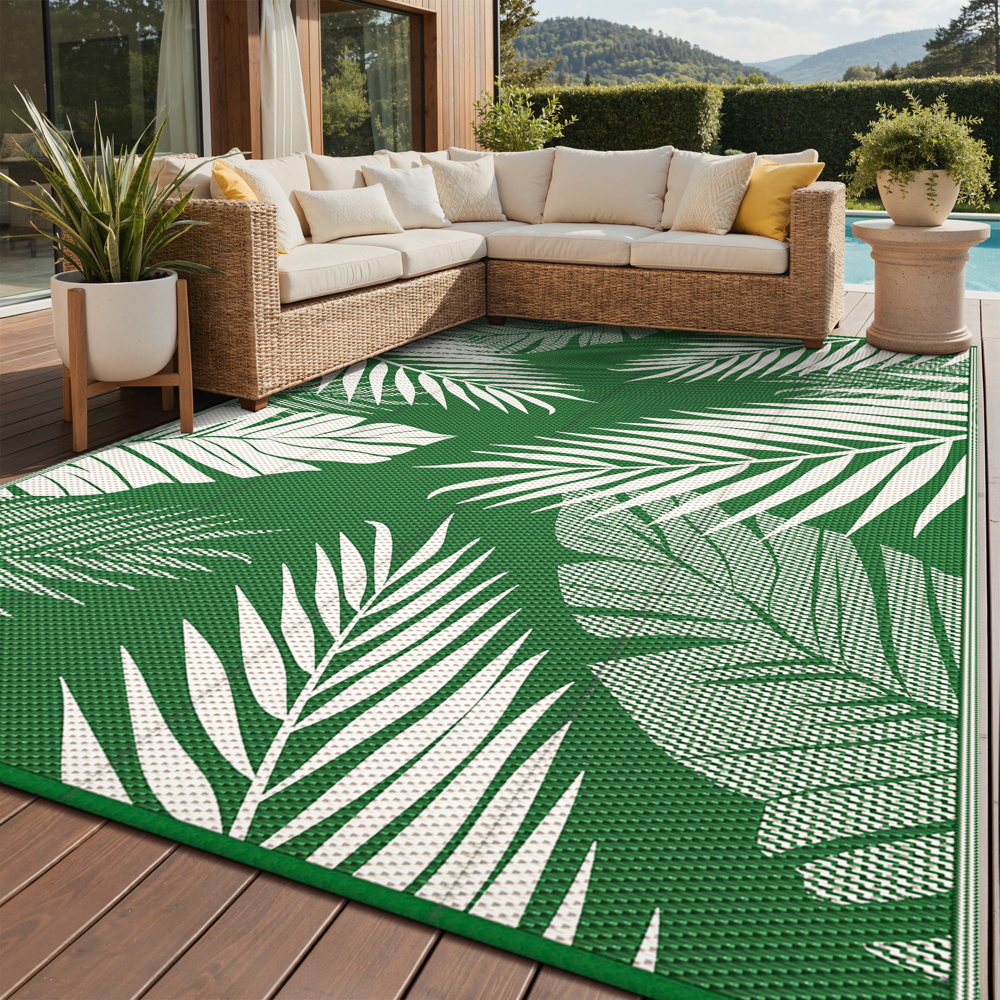 GENIMO alfombra frontal mostrando diseño hoja de palma y durabilidad