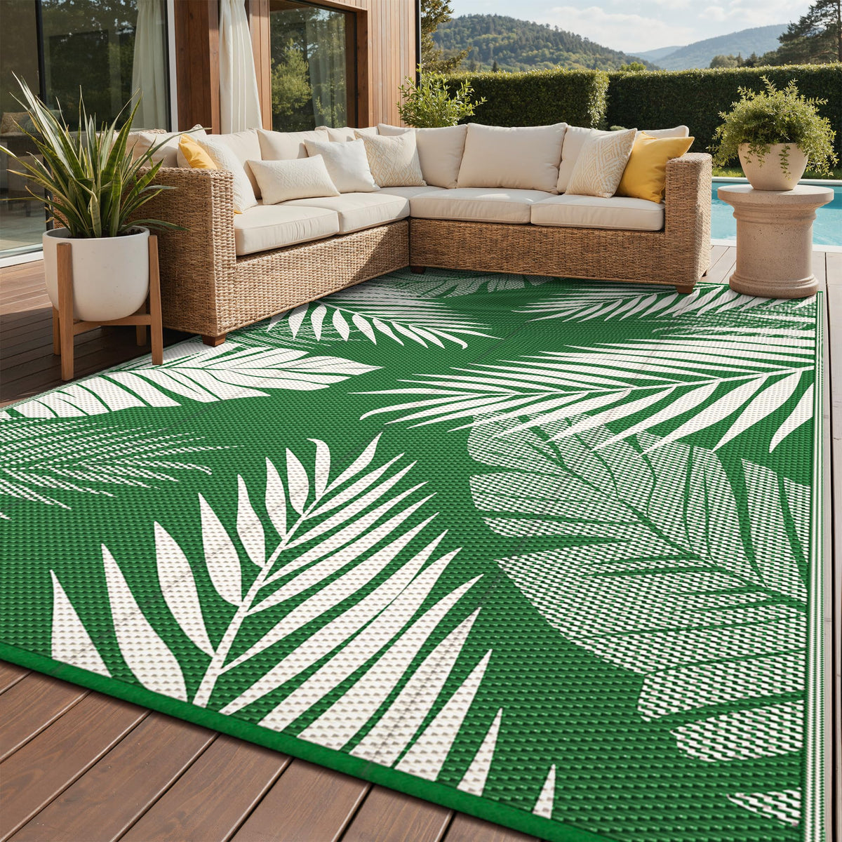 GENIMO alfombra frontal mostrando diseño hoja de palma y durabilidad