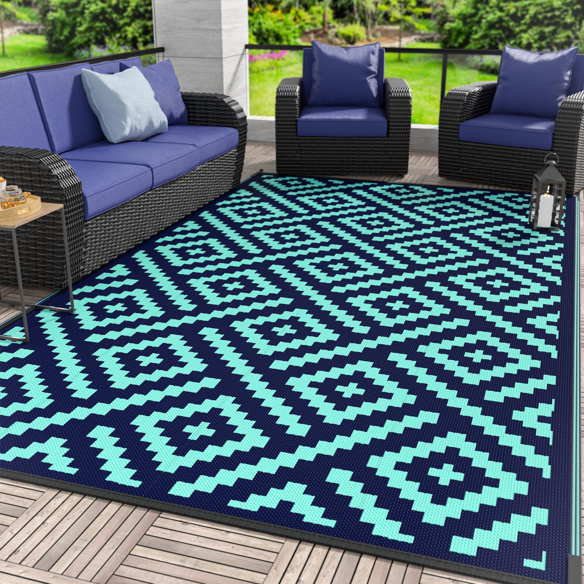 GENIMO alfombra frente 6'x9' mostrando patrón azul-verde y aspecto resistente