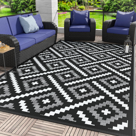 GENIMO alfombra frontal 6'x9' Ink White mostrando patrón reversible y beneficio estético