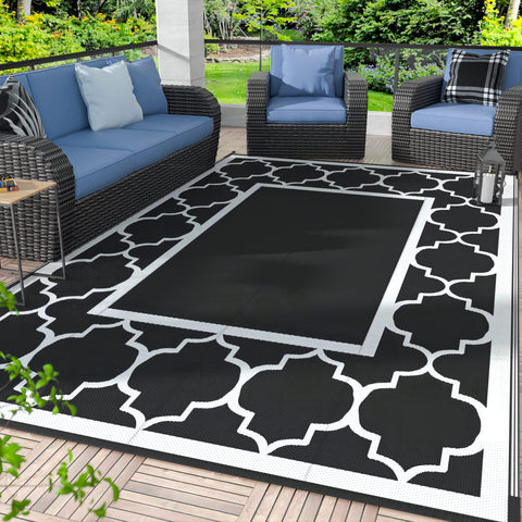 GENIMO alfombra exterior frontal mostrando patrón y tamaño práctico