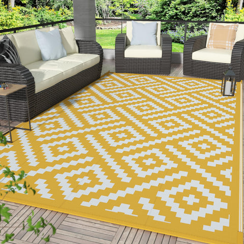 GENIMO alfombra frontal mostrando patrón amarillo blanco y beneficio estético