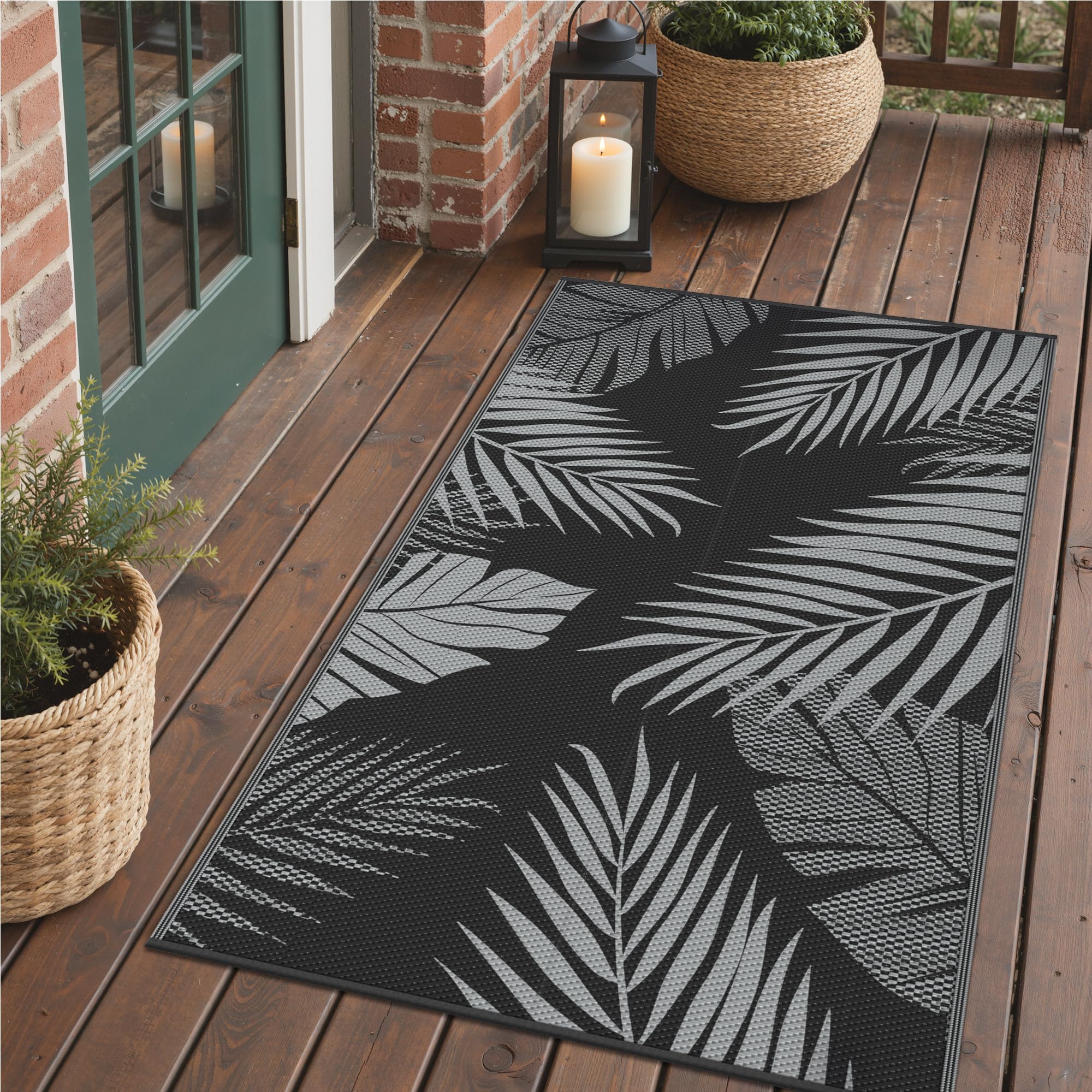 GENIMO alfombra exterior frontal mostrando diseño hoja de palma y apariencia atractiva
