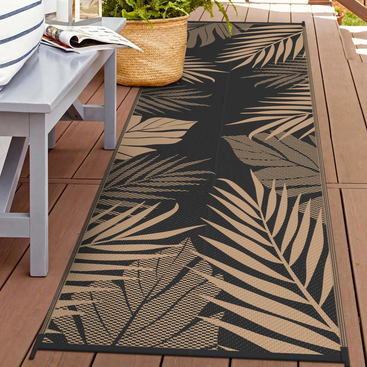 GENIMO alfombra exterior frontal mostrando diseño hojas y protección UV