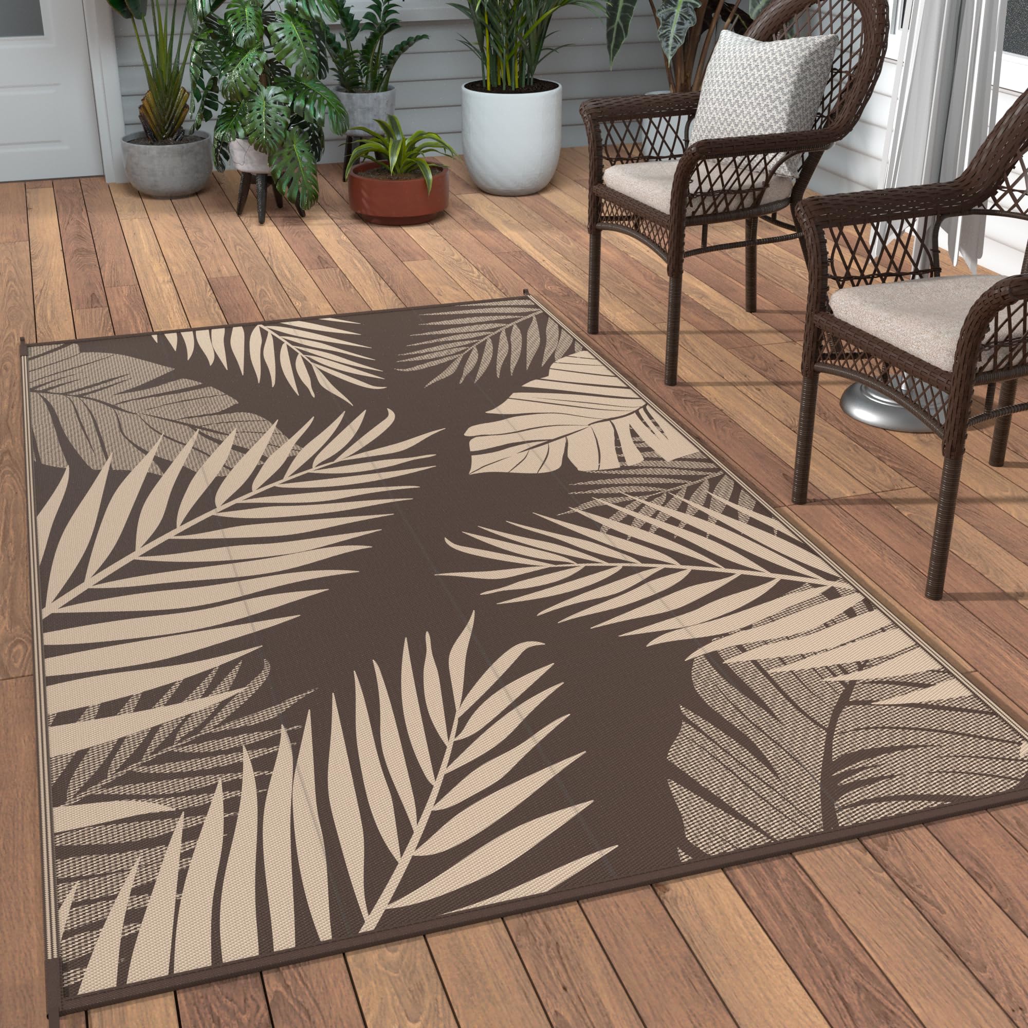 GENIMO alfombra frontal color café mostrando diseño hojas de palma y aspecto decorativo