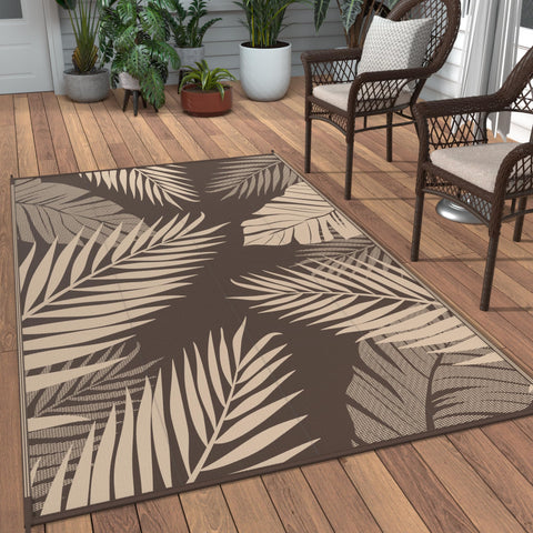 GENIMO alfombra frontal color café mostrando diseño hojas de palma y aspecto decorativo