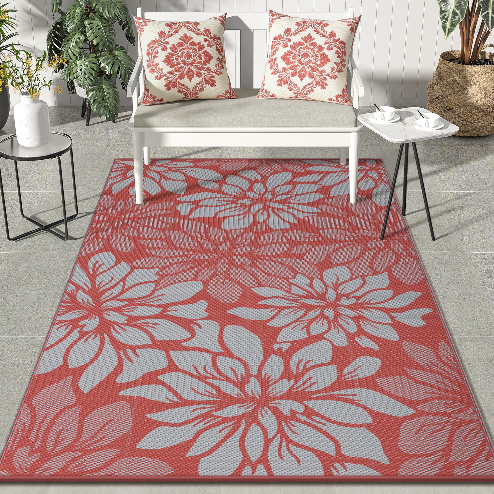 GENIMO alfombra exterior frontal mostrando diseño rojo gris y beneficio estético