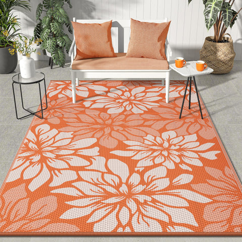 GENIMO alfombra exterior frontal mostrando colores naranja beige y patrón