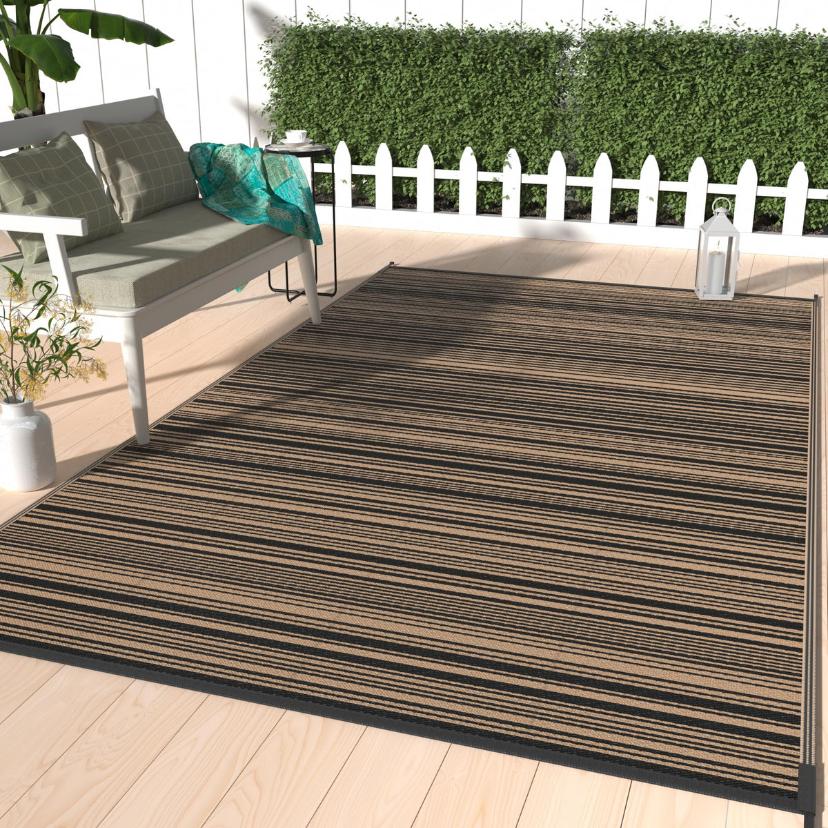 GENIMO alfombra exterior frontal mostrando patrón reversible y color marrón claro