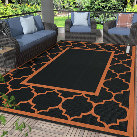 GENIMO alfombra exterior frontal muestra diseño negro naranja y beneficio estético