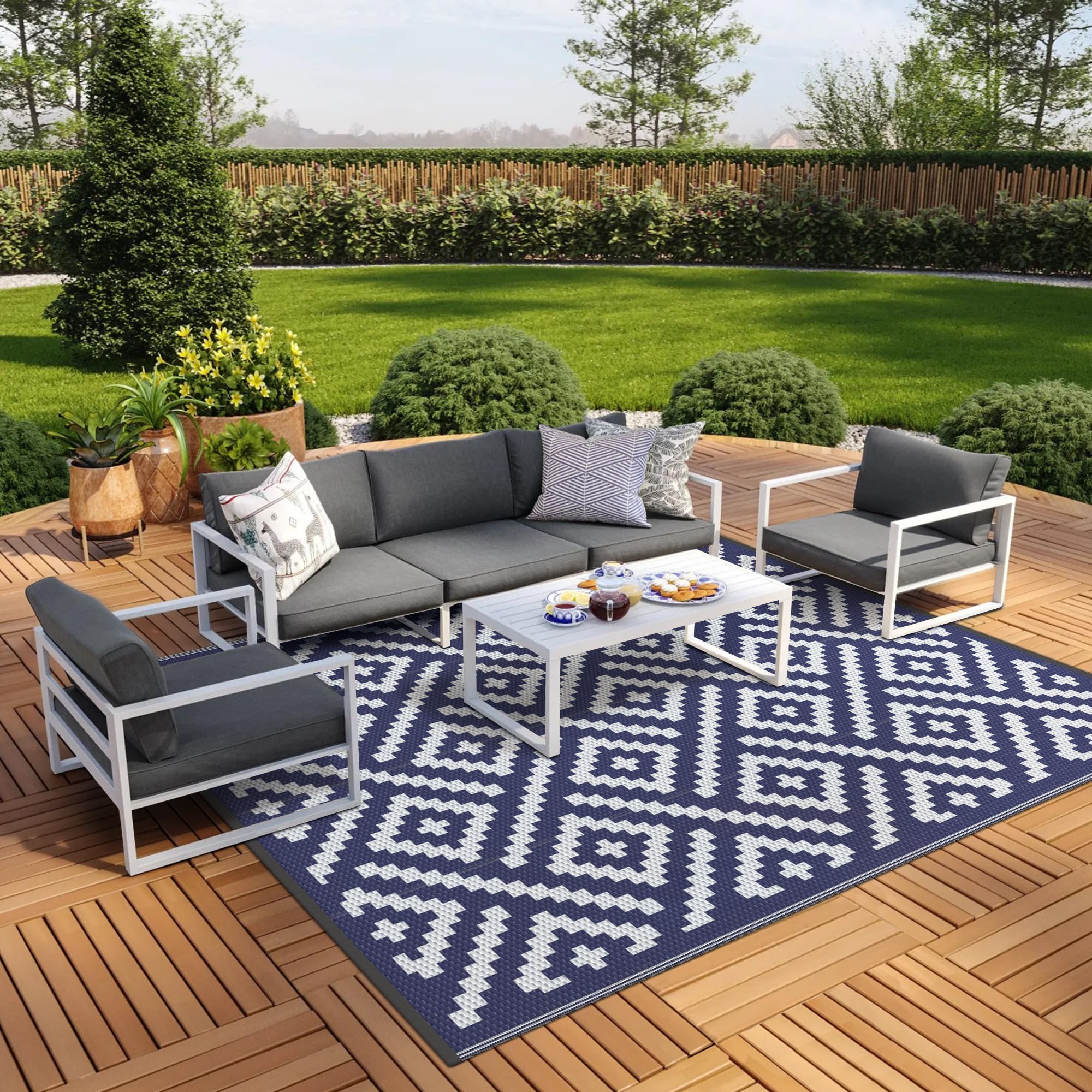 GENIMO alfombra frontal 9x12 mostrando patrón azul blanco y protección