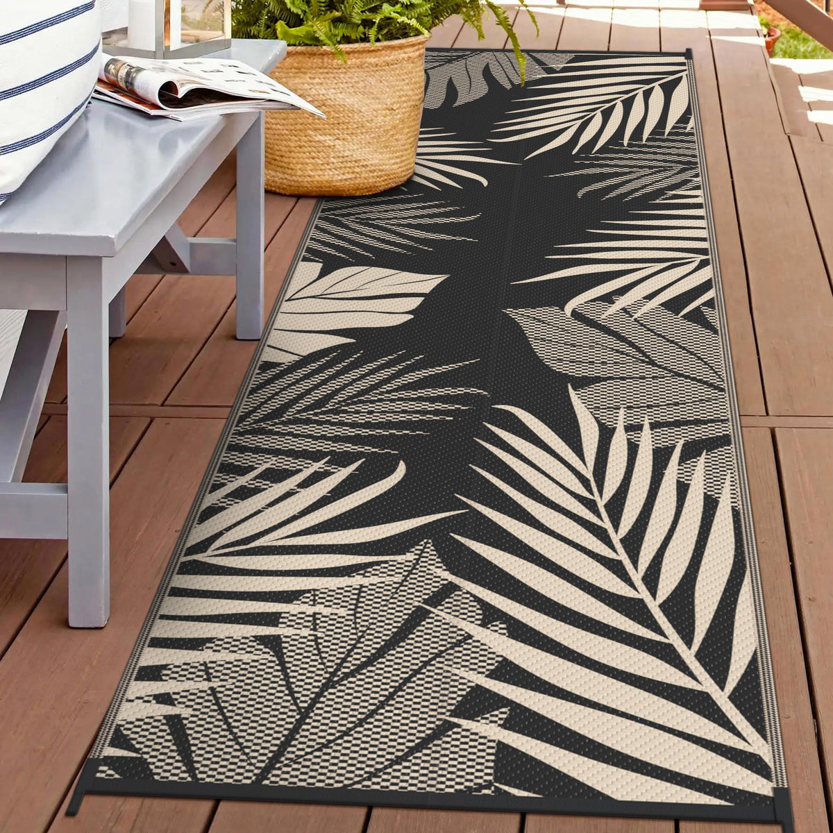GENIMO alfombra frontal panorámica mostrando diseño hoja de palma y estética exterior