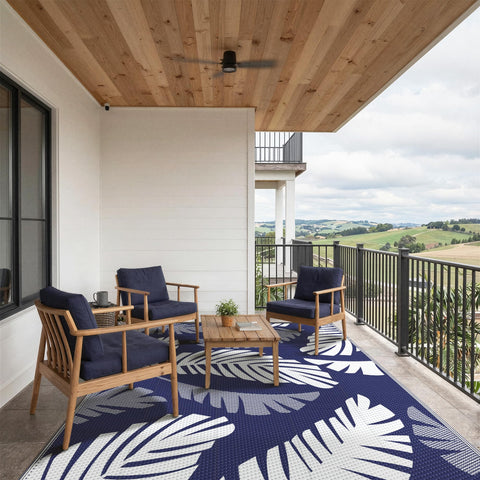 GENIMO comparación de tamaño junto a mesa y sillas, cubre área de comedor