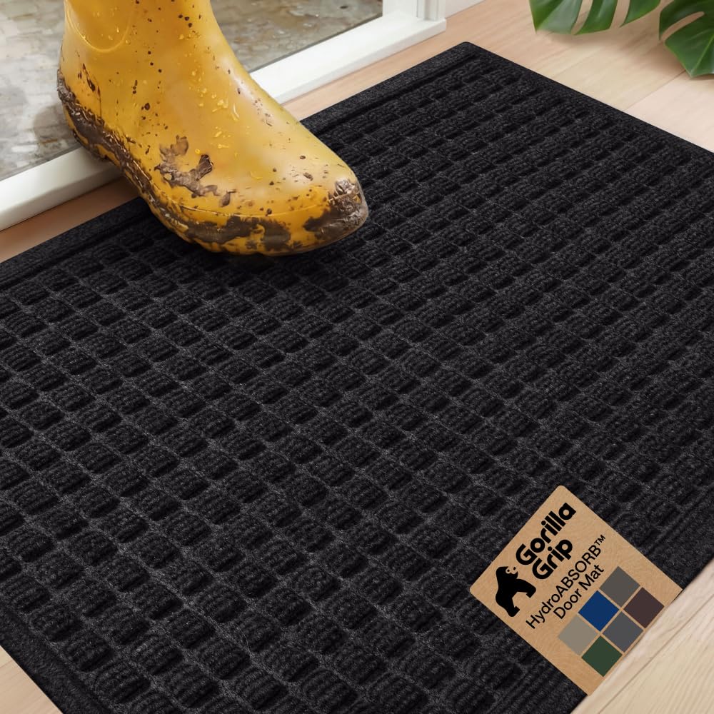 GORILLA GRIP felpudo frontal negro mostrando absorción y aspecto resistente