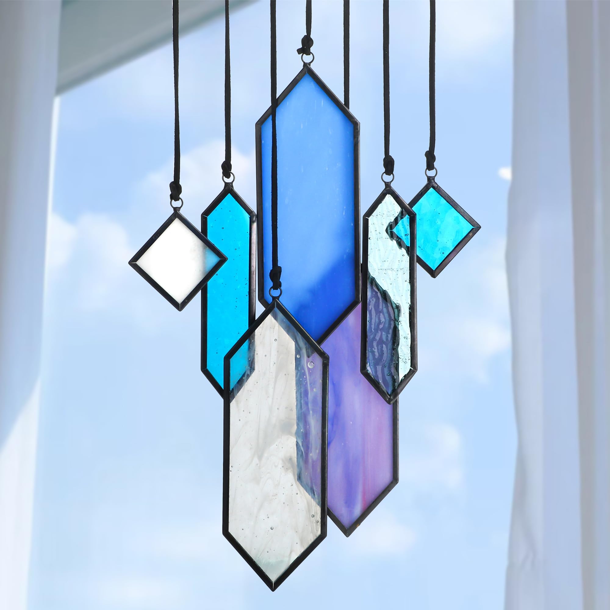 HDCRYSTALGIFTS panel frontal azul mostrando diseño y brillo