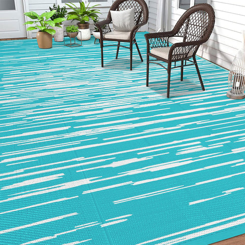 HEBE alfombra exterior frontal mostrando rayas y tamaño, aporta estilo al patio