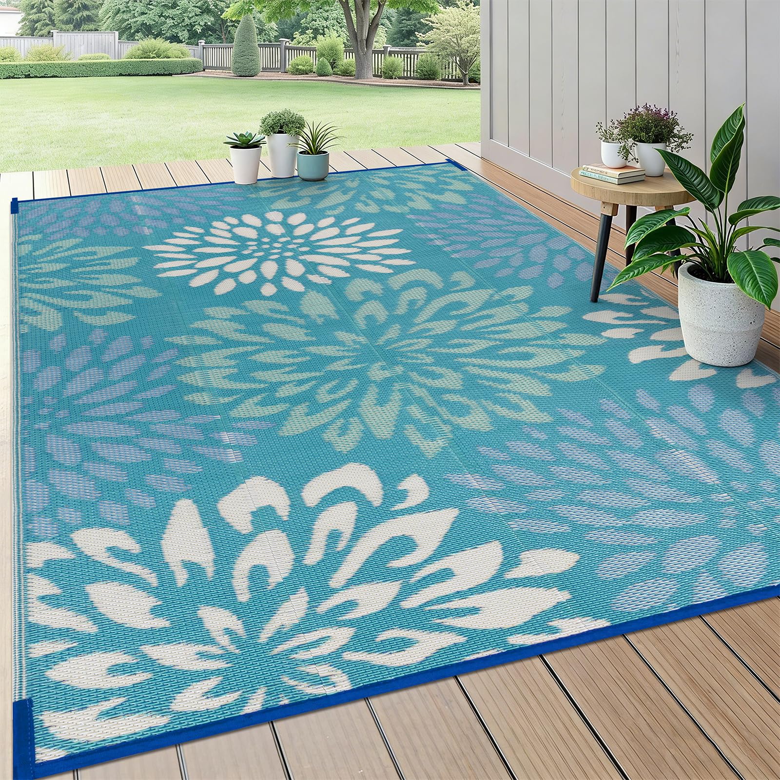 HEBE alfombra exterior frontal mostrando patrón floral y beneficio decorativo