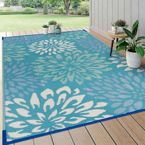 HEBE alfombra exterior frontal mostrando patrón floral y beneficio decorativo