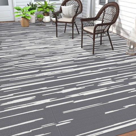 HEBE alfombra frontal muestra diseño a rayas y protección impermeable