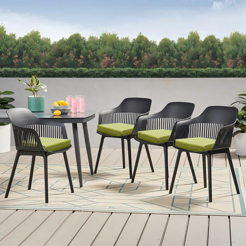 HOMELYSIAN cojín en terraza con mesa y plantas, mejora el estilo exterior