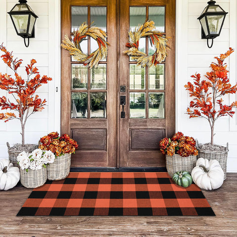 Homydecor alfombra frontal en cuadros naranja y negro mostrando diseño atractivo