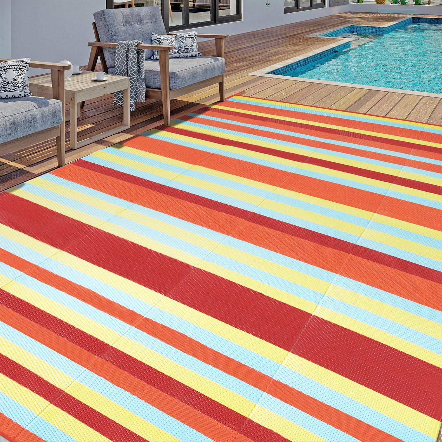 HUGEAR alfombra exterior frente mostrando rayas coloridas y beneficio estético