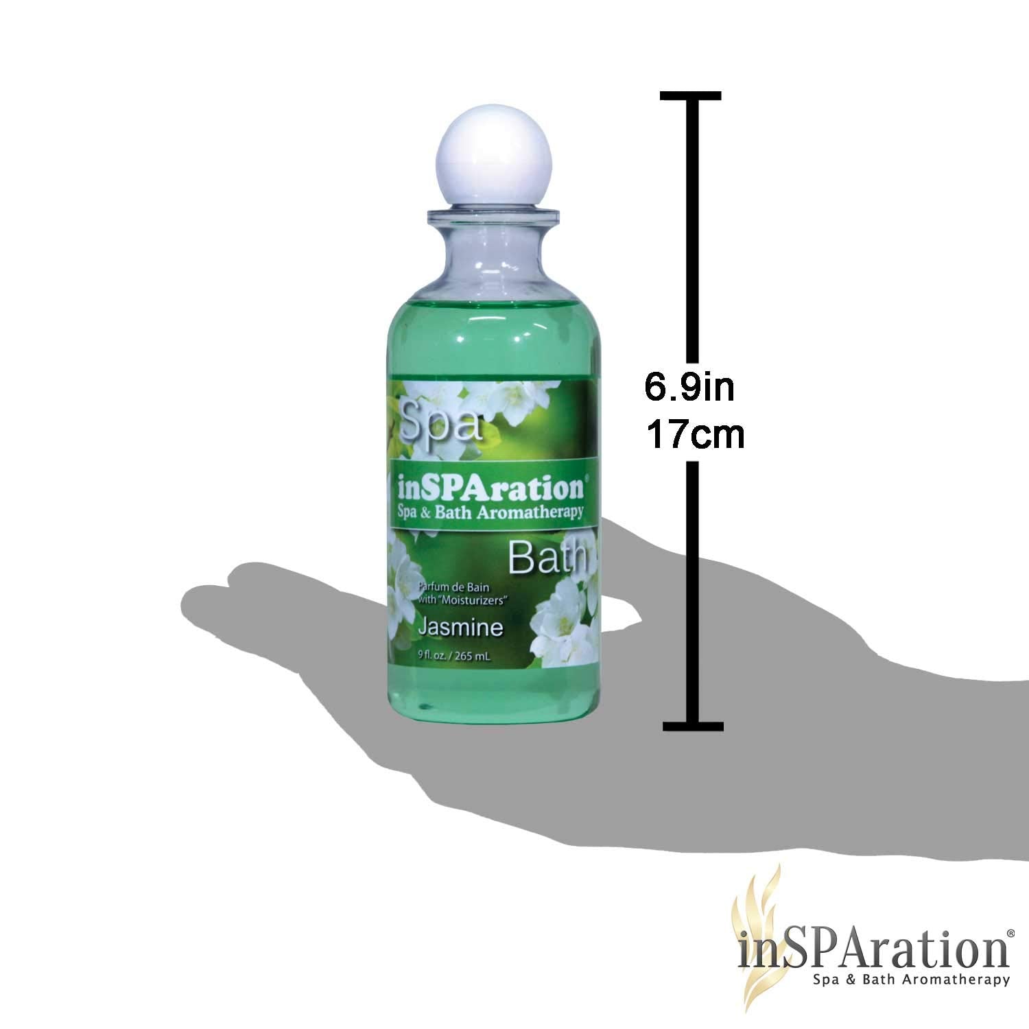 inSPAration frasco de 9 oz al lado de una mano para escala práctica