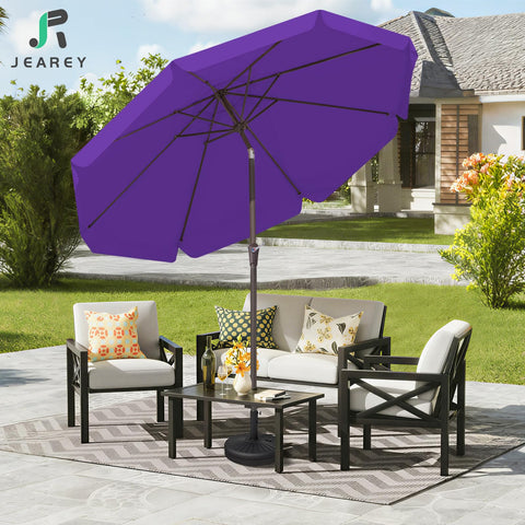 JEAREY sombrilla instalada en patio real creando zona de relax