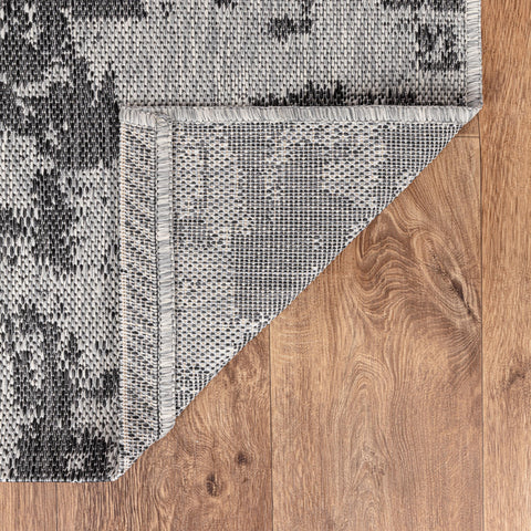 Keen Home Design alfombra mojada demostrando resistencia al agua