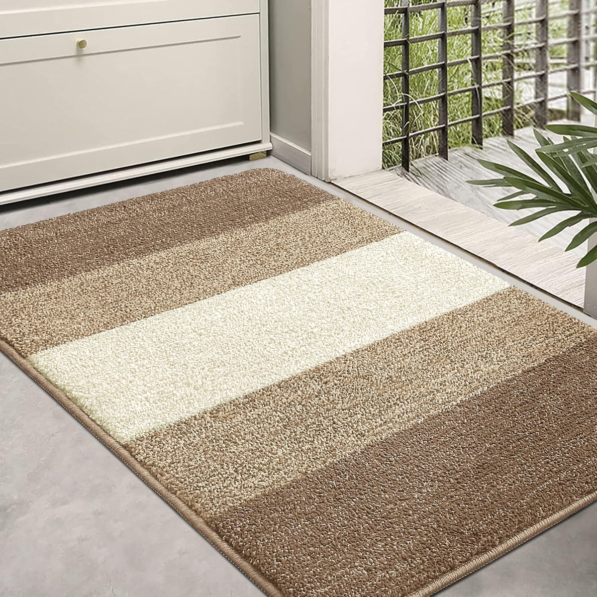 Kitinjoy felpudo frontal 36x24 mostrando diseño y tamaño práctico