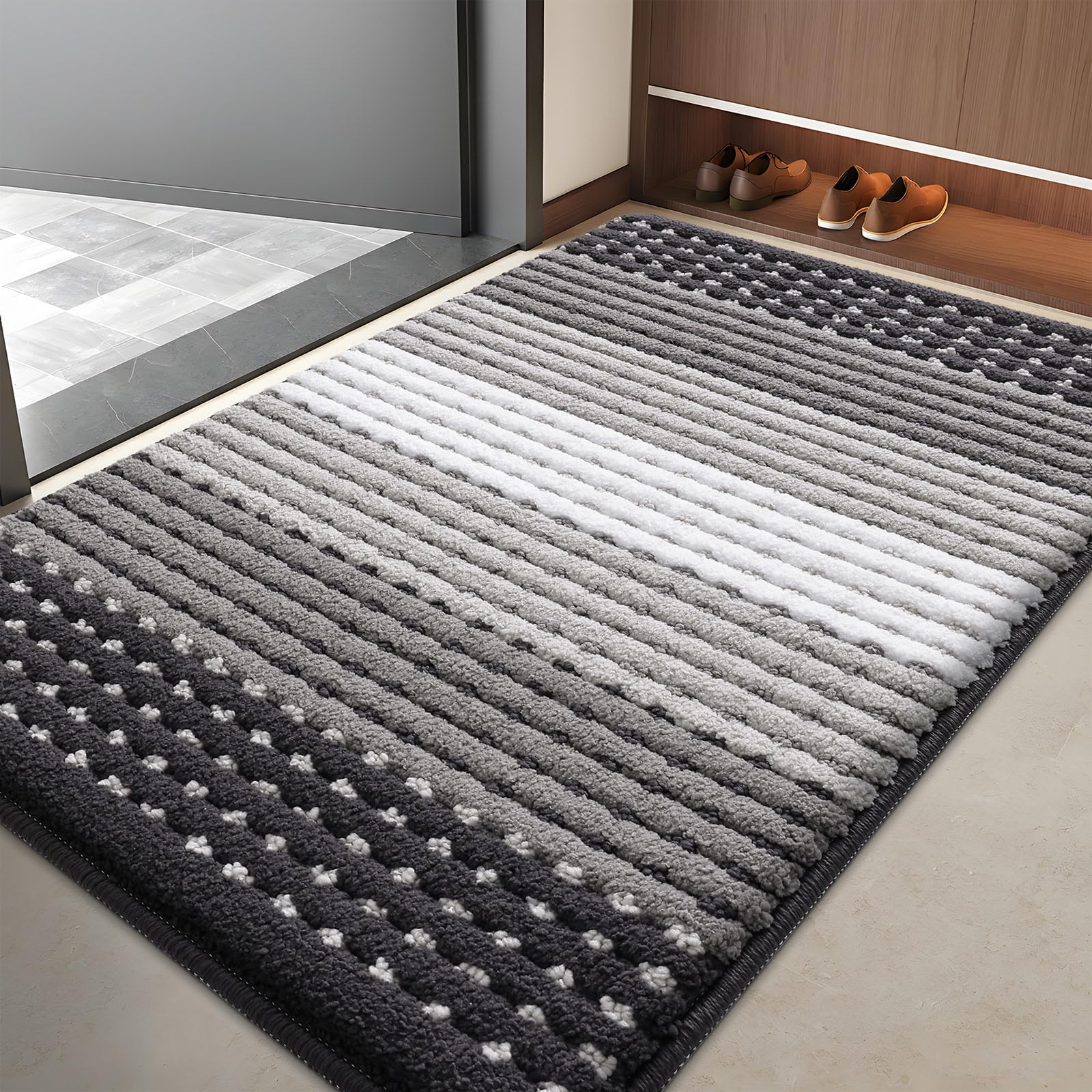 Kitinjoy felpudo frontal 40x32 atrapando suciedad y manteniendo entrada limpia