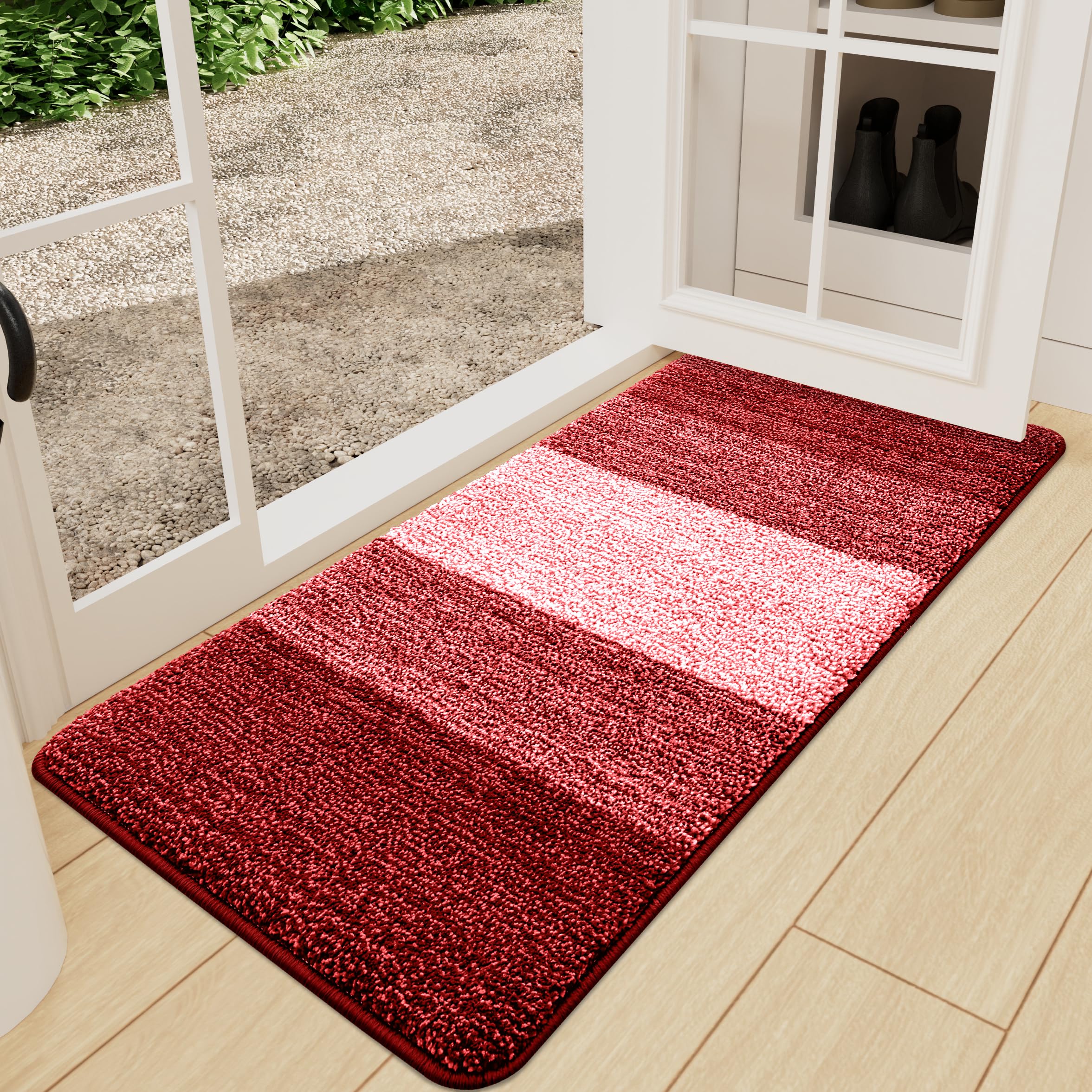 Kitinjoy felpudo frontal en entrada protegiendo suelos