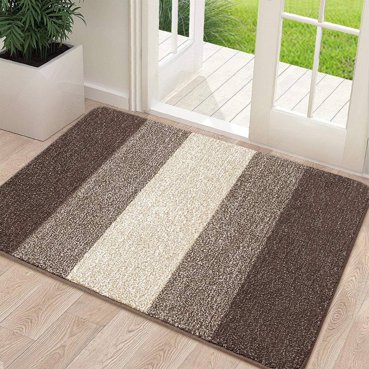 Kitinjoy felpudo vista frontal muestra diseño absorbente y entrada limpia