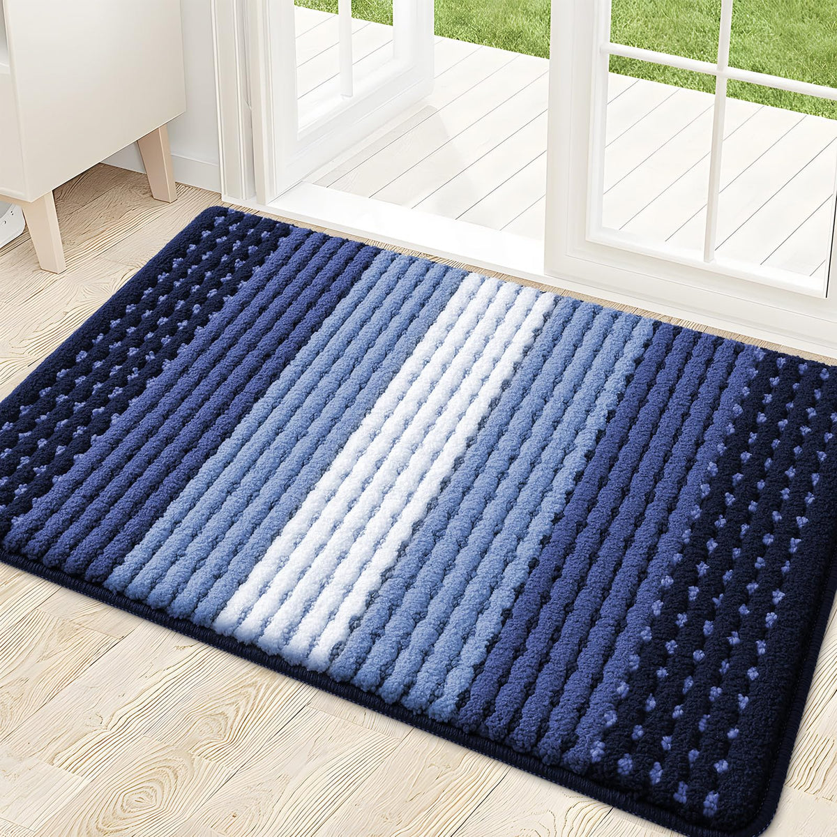 Kitinjoy vista frontal del felpudo mostrando diseño y tamaño práctico