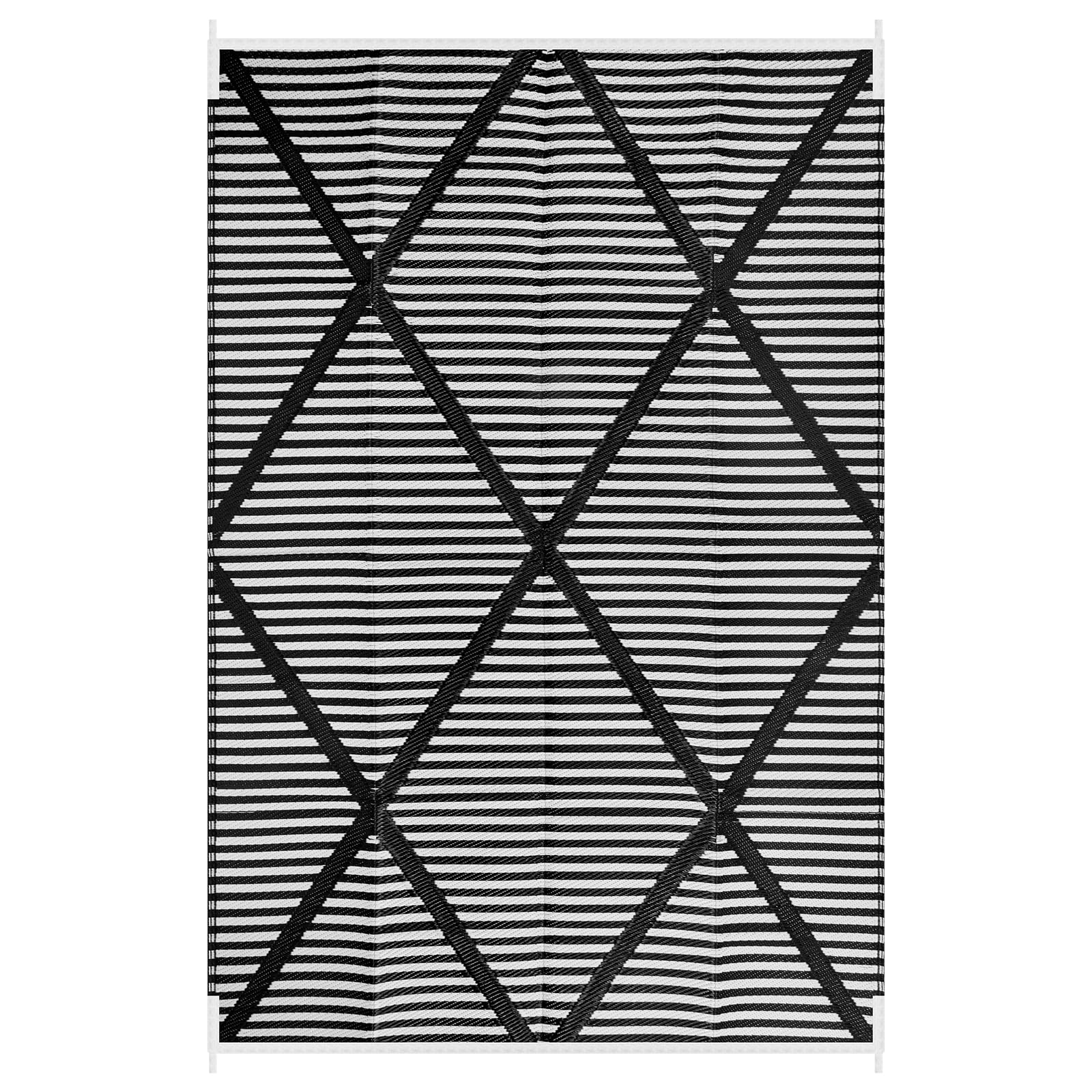 Lahome alfombra junto a una silla para comparar tamaño 6x9