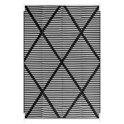 Lahome alfombra junto a una silla para comparar tamaño 6x9