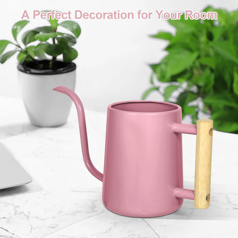 LTSUMI regadera rosa en mesa con plantas mostrando estilo y funcionalidad