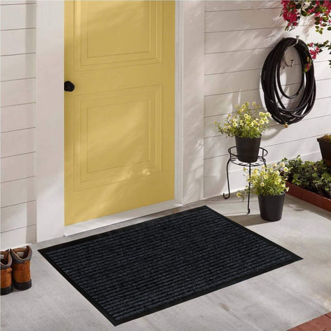 Estilo de vida: felpudo LuxUrux en entrada de hogar elegante y funcional