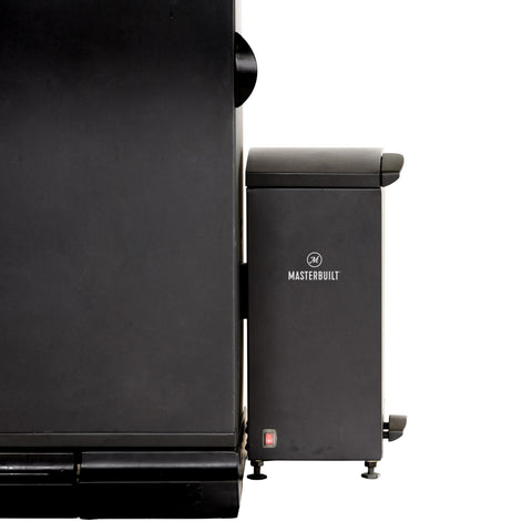 Masterbuilt comparación de escala con mano que muestra dimensiones