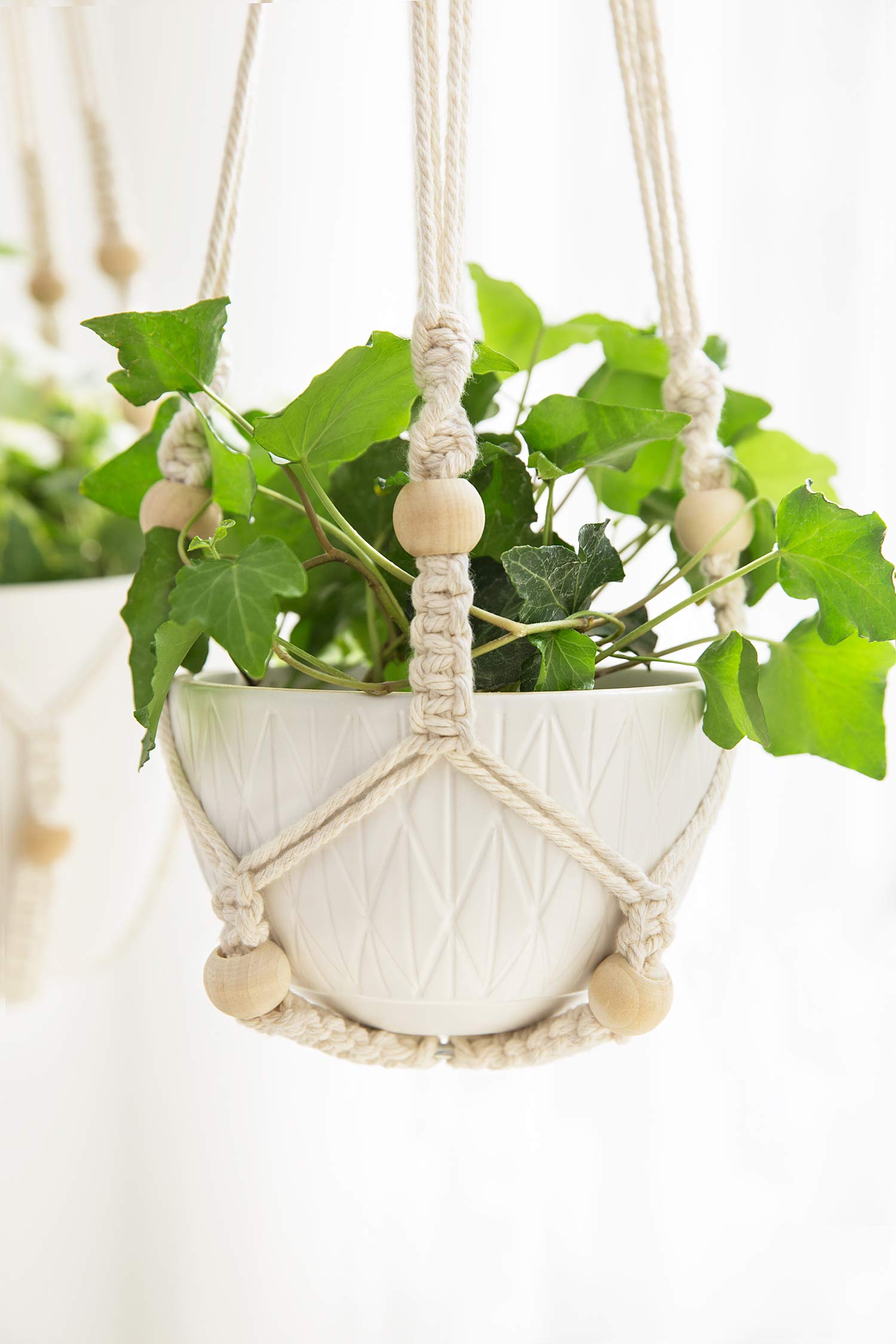 Mkono colgador en habitación estilo boho, añade calidez decorativa