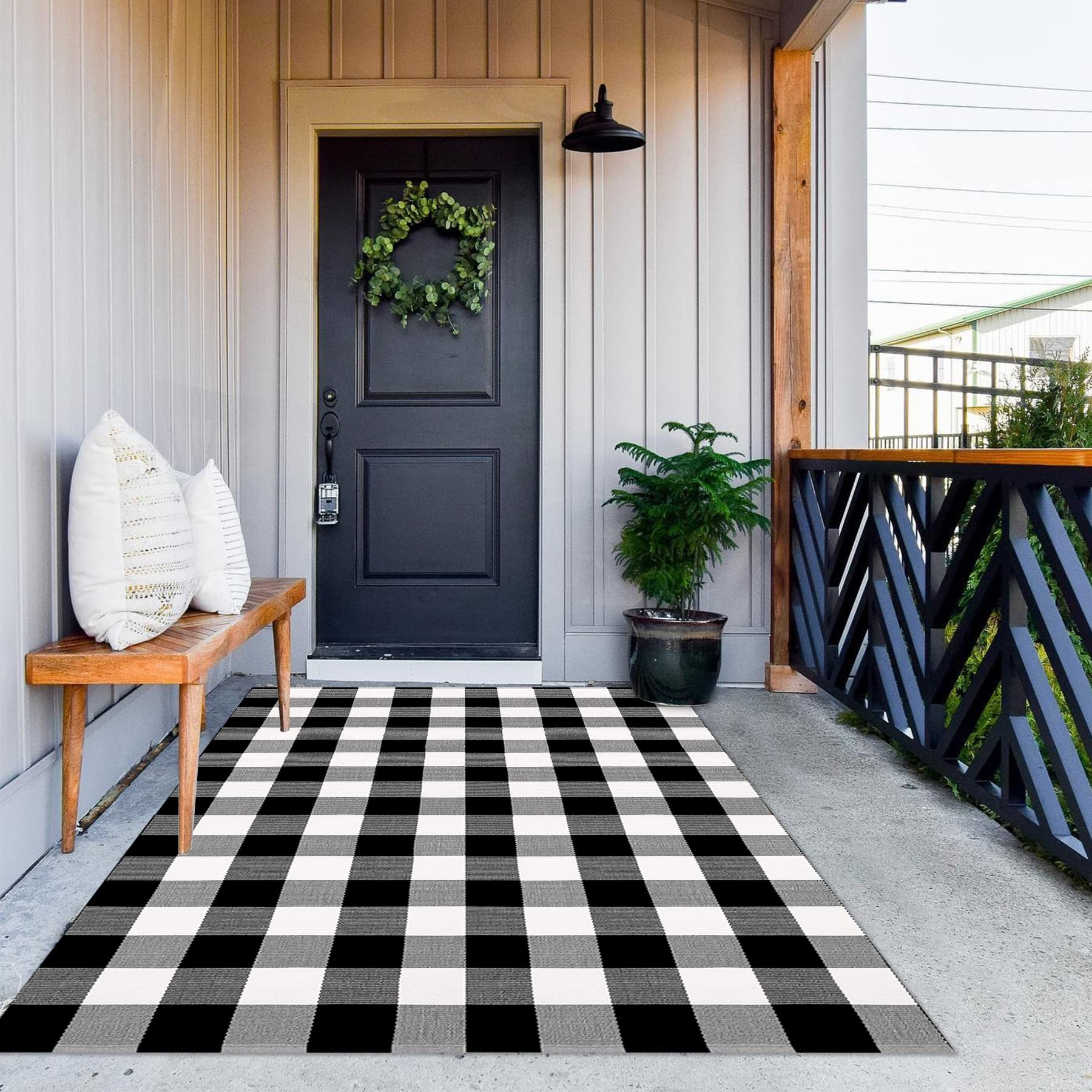 MUBIN alfombra frontal 4x6 mostrando patrón buffalo plaid y acogida