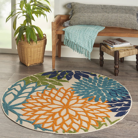 Nourison alfombra bajo mesa de comedor exterior para definir área social