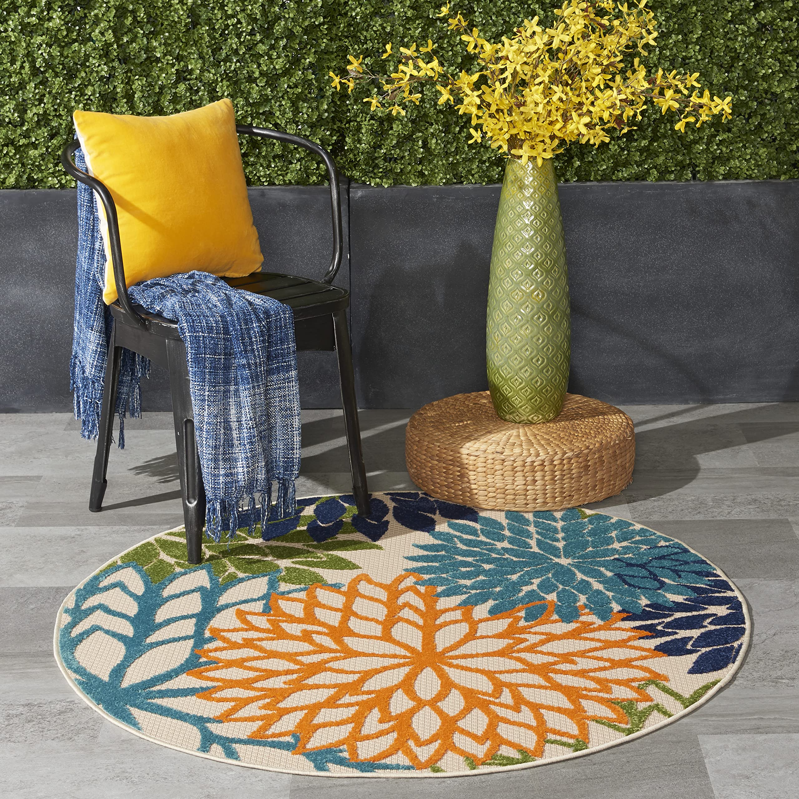 Nourison alfombra frontal mostrando colores tropicales y bienvenida visual