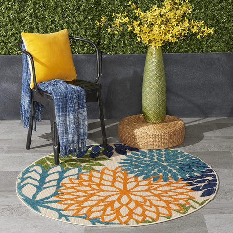 Nourison alfombra frontal mostrando colores tropicales y bienvenida visual